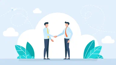 Two men with ties shaking hands