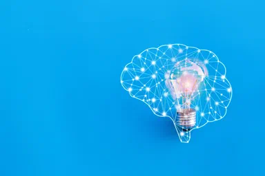 A brain depicted as a network generating an idea